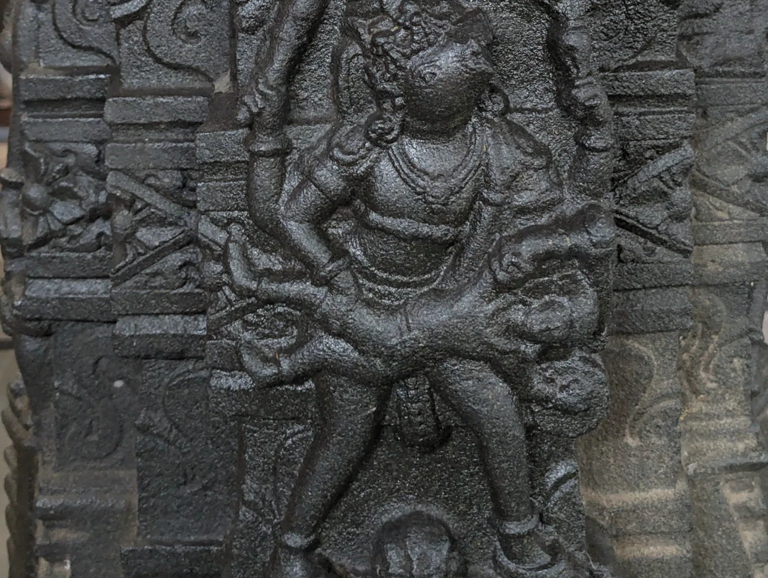 A sculpted relief on the pillar, possibly depicting Varaha