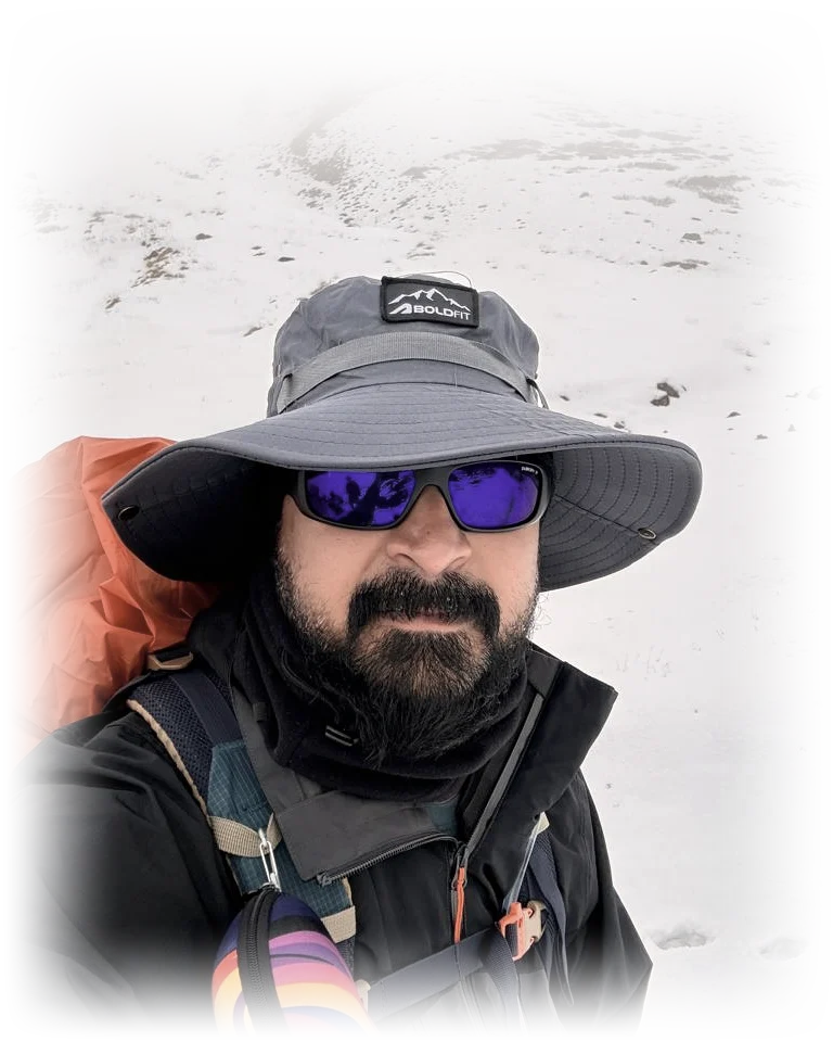 Chaitanya Chinta on the walk in to Annapurna Base Camp, Nepal, in snow and cloud