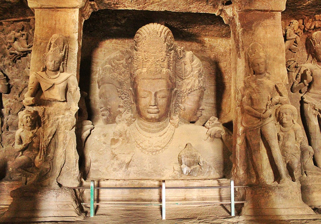 Shiva in Elephenta caves, representing three aspects, creation, protection, and destruction