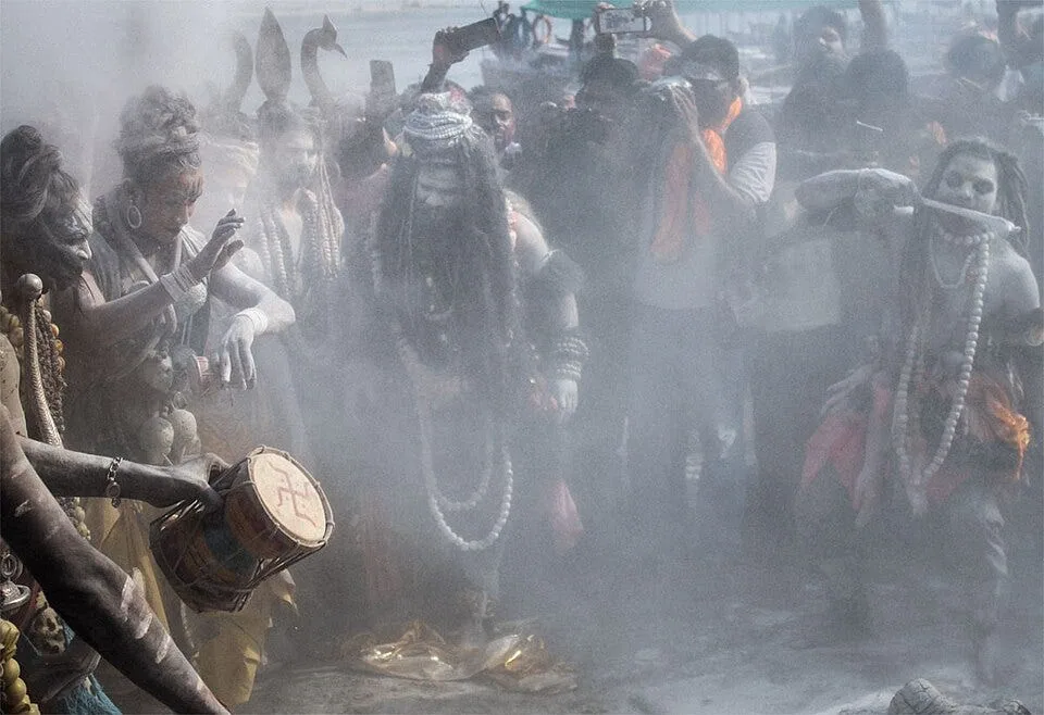Agoris dance to the rhythm of Darmus (Indian drums) around the cremation pyre in Varanasi, India