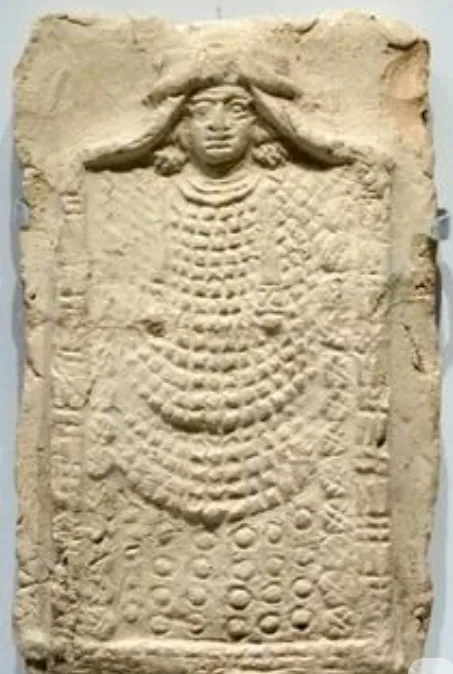 Plaque depicting a richly dressed goddess. From Babylonia, 2nd millennium BC.